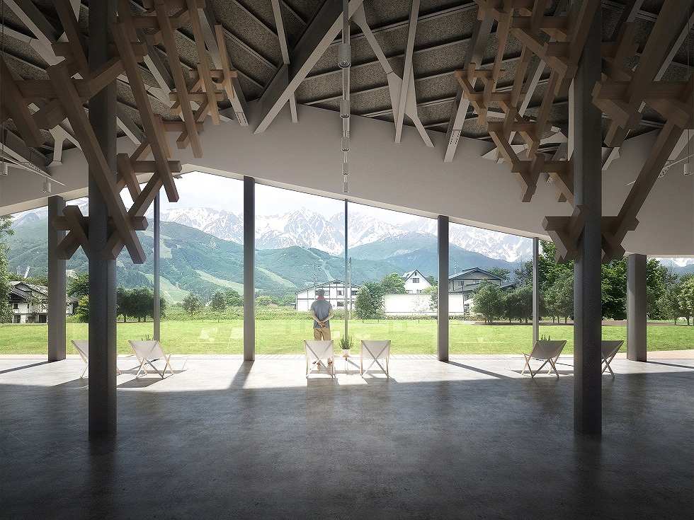 建物を外から見たときのシルエットとは逆に、屋内から景色を眺めたときにも、白馬三山をきれいに切り取れるような額縁効果を狙って屋根の形を決めたそうだ。さらに、屋根を支える木の骨組みは、白馬にちなんで森の枝、雪の結晶どちらにも見えるようにした